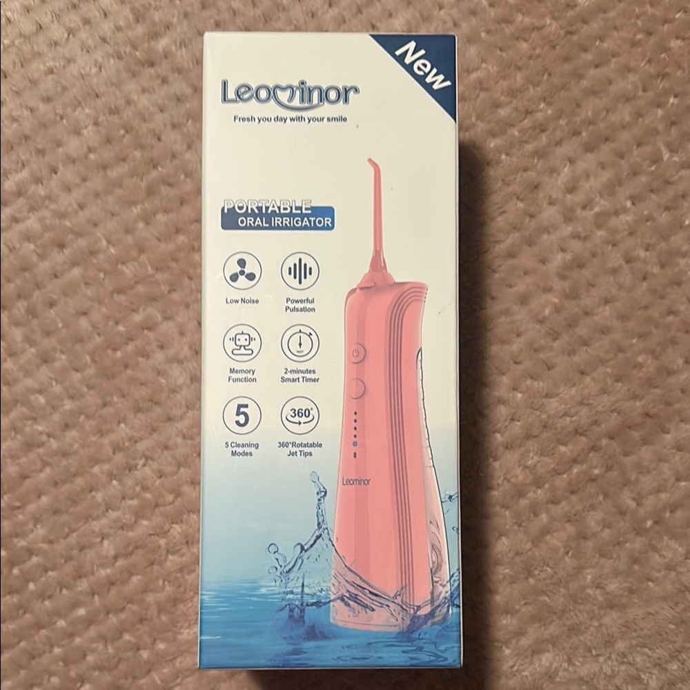 Pink Portable Oral Irrigator